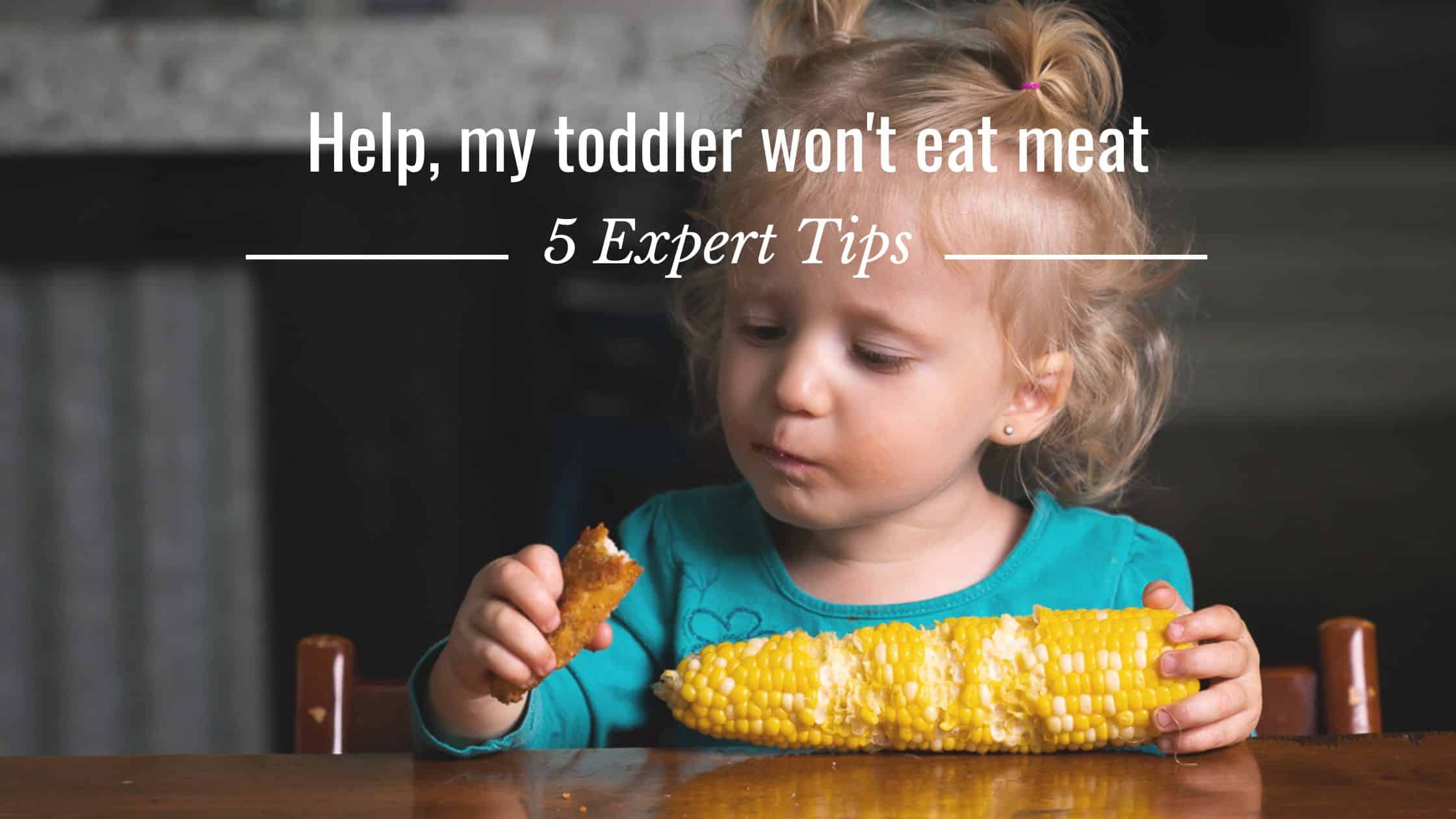 Toddler won't eat meat - child looking at a chicken nugget