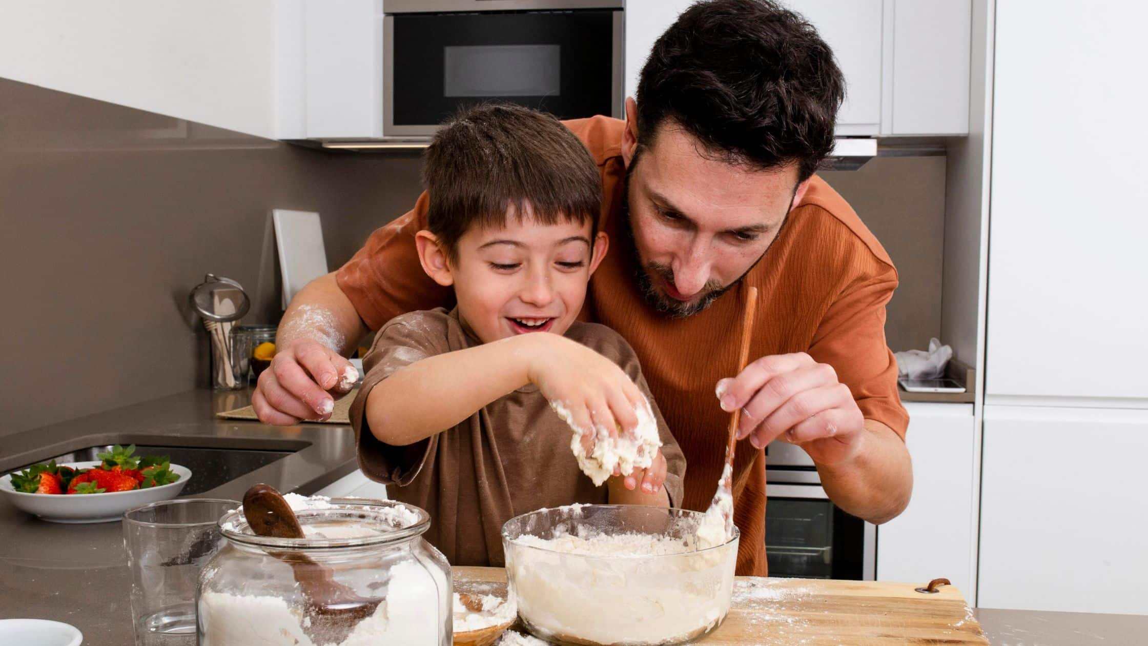 cooking with kids, father and son in the kitchen
