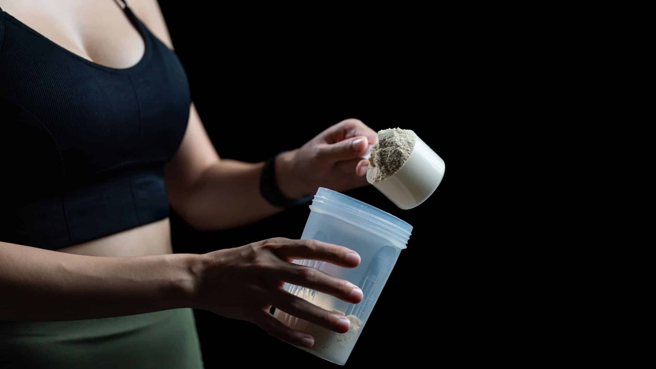 Breastfeeding woman making a protein shake